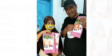 Viral, Video Ibu Rumah Tangga di Banyuwangi Tertangkap Basah Bagikan Kerudung Bergambar Paslon Dihari Tenang