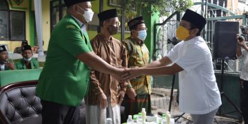 Adam Rusydi Sumbang 1000 Masker saat Hadir di Pelantikan PAC GP Ansor Waru