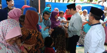 Pak Qosim Ajak Warga Anjal Selalu Ceria dan Rajin Sholawat