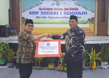 SMPN  1 Sidoarjo Beri Santunan Anak Yatim dan Dhuafa Hingga Rp 61 Juta