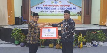 SMPN  1 Sidoarjo Beri Santunan Anak Yatim dan Dhuafa Hingga Rp 61 Juta
