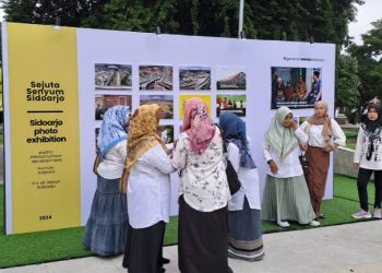 Pemuda Sidoarjo Gelar Aksi Sejuta Senyum