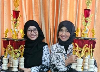 Kompak, Kepala Sekolah dan Guru SMK Negeri 2 Buduran Juara I Lomba AIP 2025