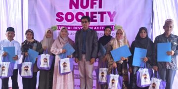 “NUFI Society” Ajari Siswa Peduli Sesama Lewat Pengobatan Gratis dan Santunan