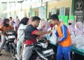 Al Muslim Jatim Bagikan 1.177 Paket Sembako Dengan Konsep Drive Thru