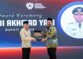 Bawa Model Perlindungan Anak PMI ke Forum Nasional, Bupati Yani Terima Penghargaan Kepala Daerah Inspiratif