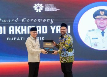 Bawa Model Perlindungan Anak PMI ke Forum Nasional, Bupati Yani Terima Penghargaan Kepala Daerah Inspiratif