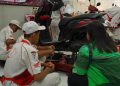 SMK Krian 2 Sidoarjo Sukses Gelar Servis dan Ganti Oli Gratis Milik Puluhan Ojol
